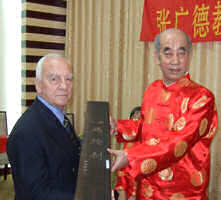 Richard receives a sword from Professor Zhang