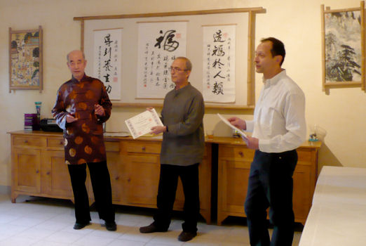 Andre Peret and Mark Atkinson receive their diplomas